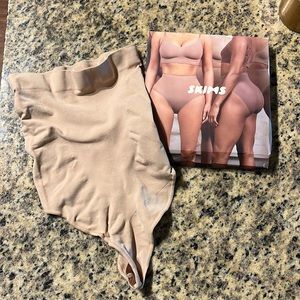 Skims Seamless Sculpting Thong High Waist Shapewear in clay